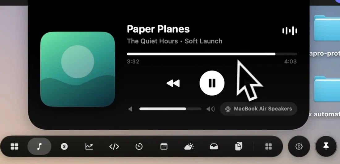 NotchPop Media Island with album artwork and music playback controls