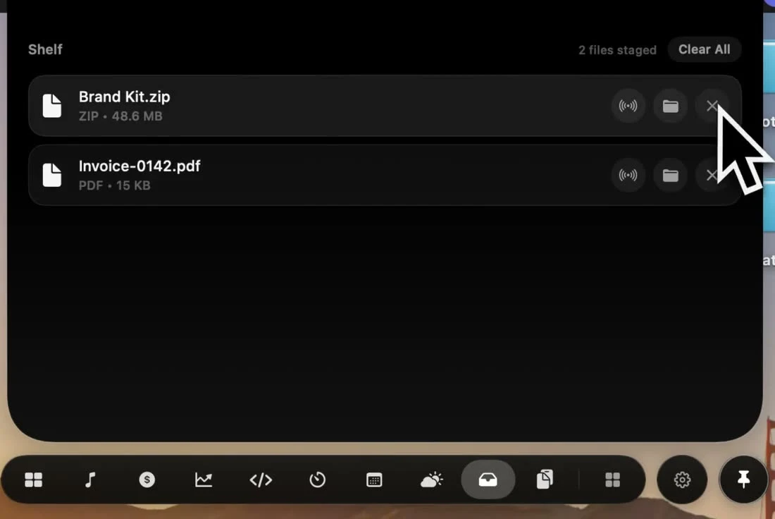 NotchPop file shelf showing staged files with AirDrop, Finder and remove controls